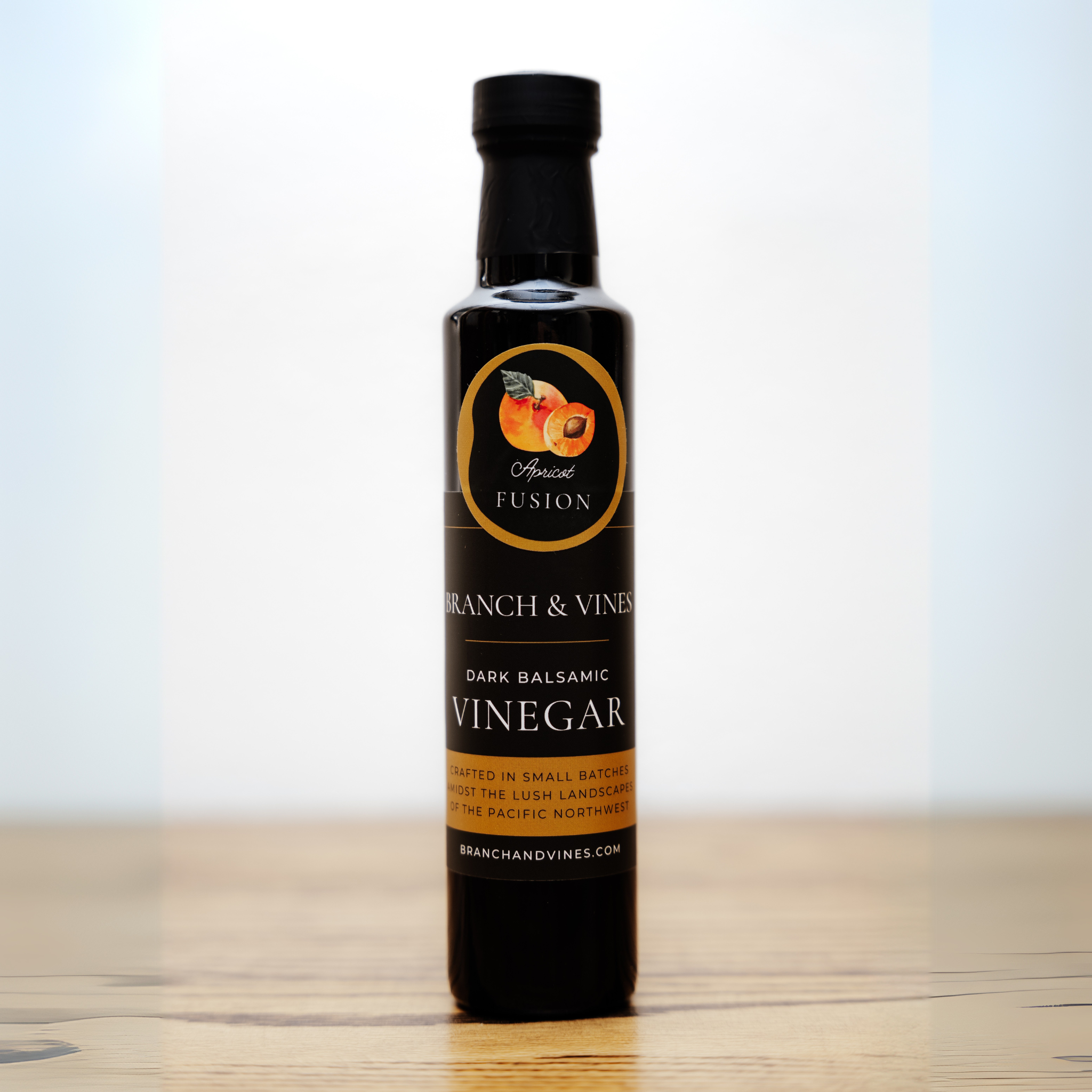 Apricot Fusion Balsamic Vinegar bottle on white background.