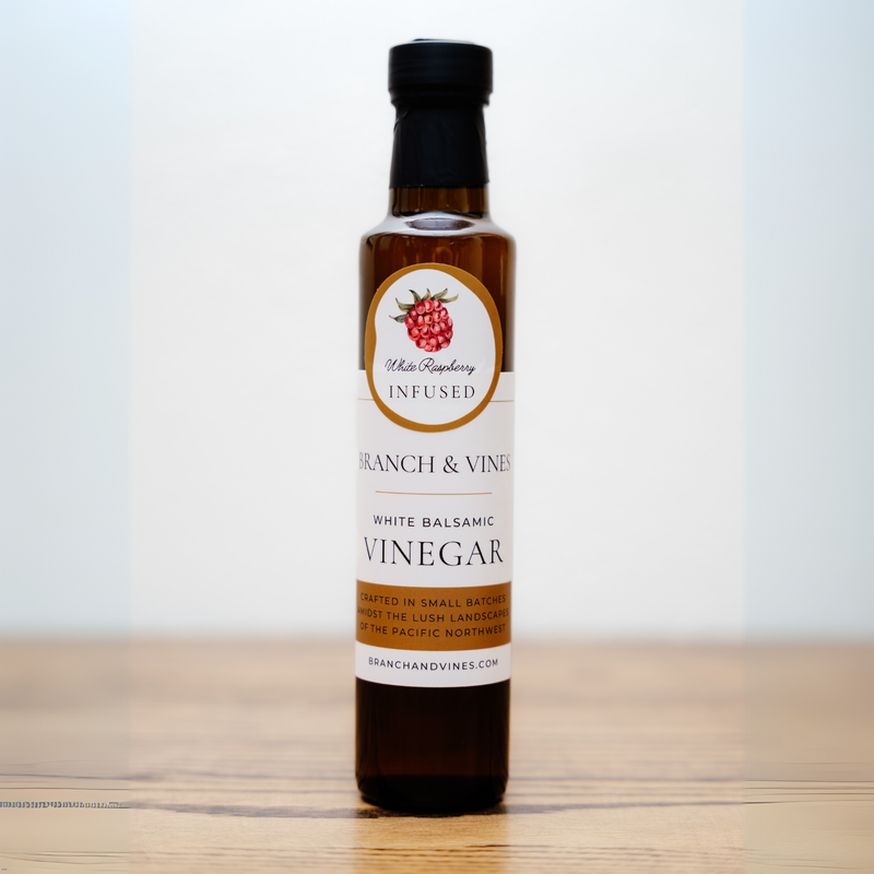 Raspberry White Balsamic Vinegar bottle on a clean white background.