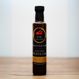 Thai Bird Chili Infused Olive Oil bottle on a clean white background.